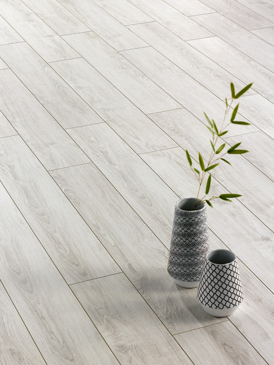 Polar Oak Laminate 12mm, laminate flooring for kitchens, hallways and living rooms at Irwin Tiles