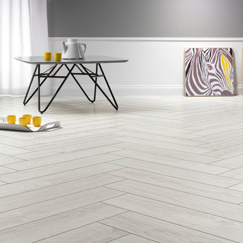 Polar Oak Herringbone Laminate 12mm, matt laminate flooring for living rooms, bedrooms and hallways at Irwin Tiles