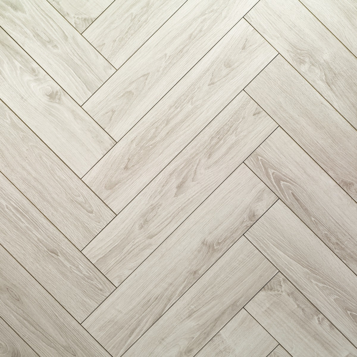 Polar Oak Herringbone Laminate 12mm, matt laminate flooring at Irwin Tiles