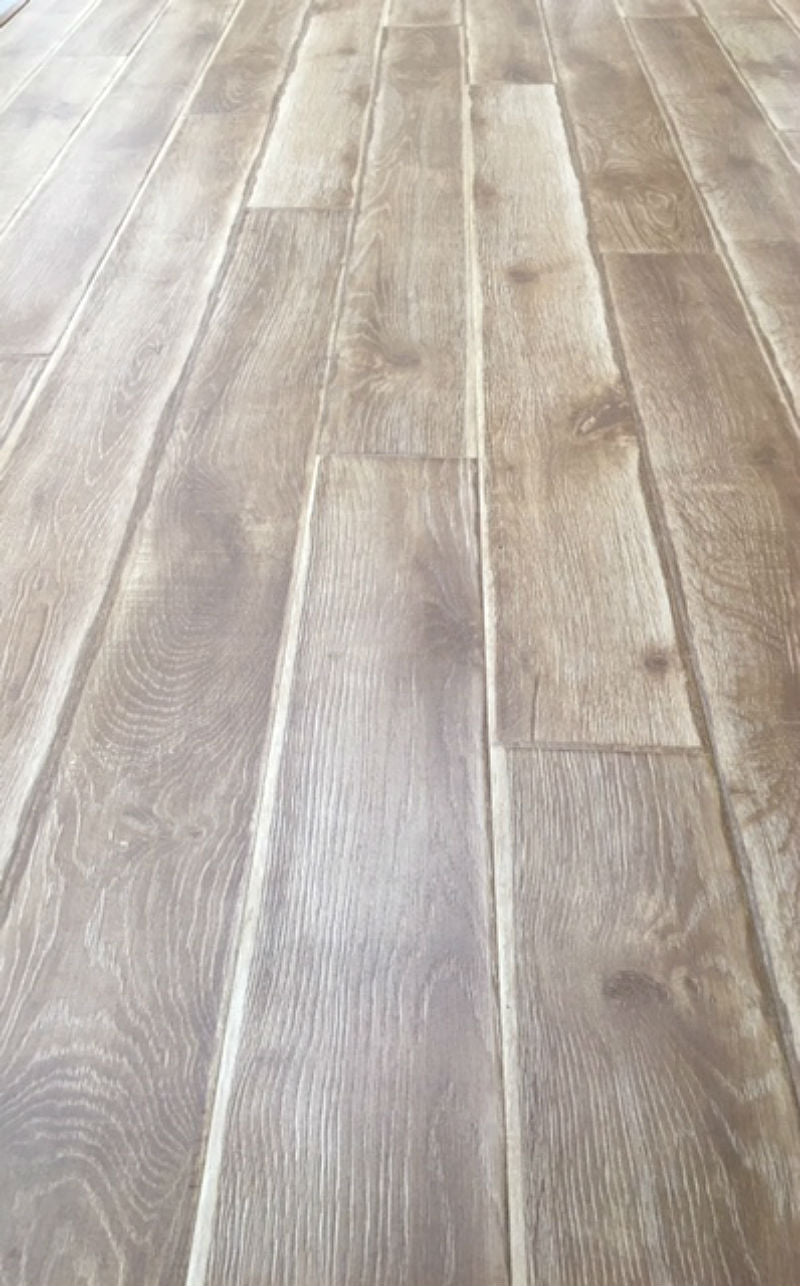 Ash Husk Laminate 12mm, light laminate flooring at Irwin Tiles