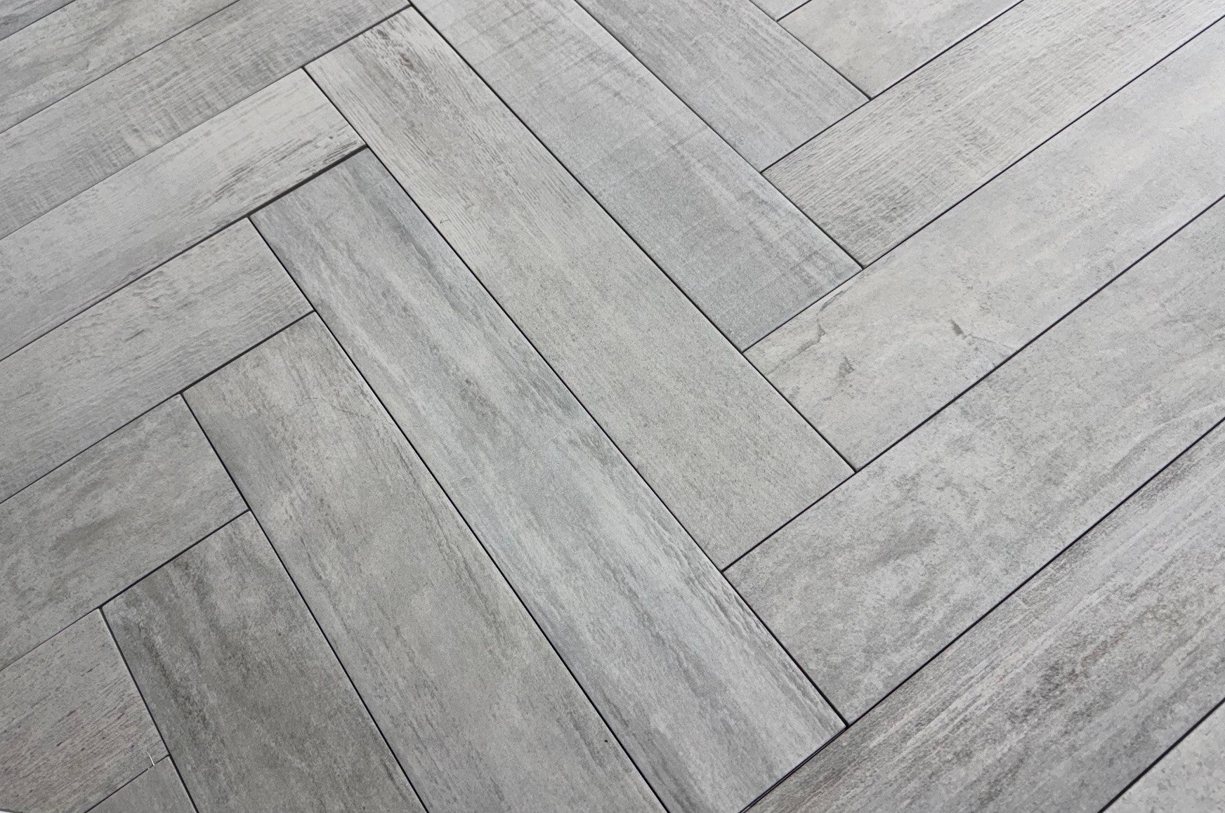 Beziers Cenzia Herringbone 10 x 49cm, light wood effect matt tile at Irwin Tiles