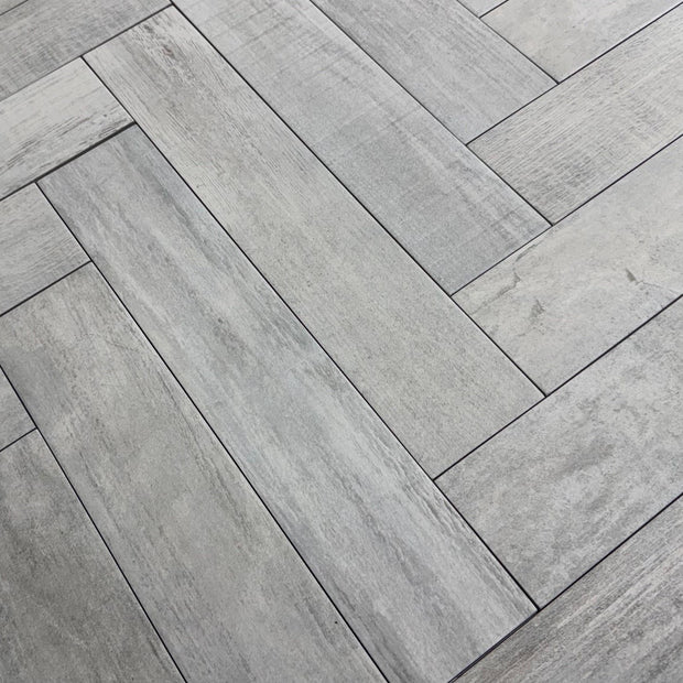 Beziers Cenzia Herringbone 10 x 49cm, light wood effect matt tile at Irwin Tiles