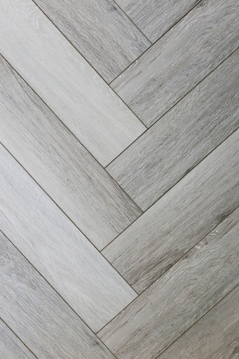 Cool Grey Herringbone Laminate 12mm Waterproof, laminate flooring at Irwin Tiles