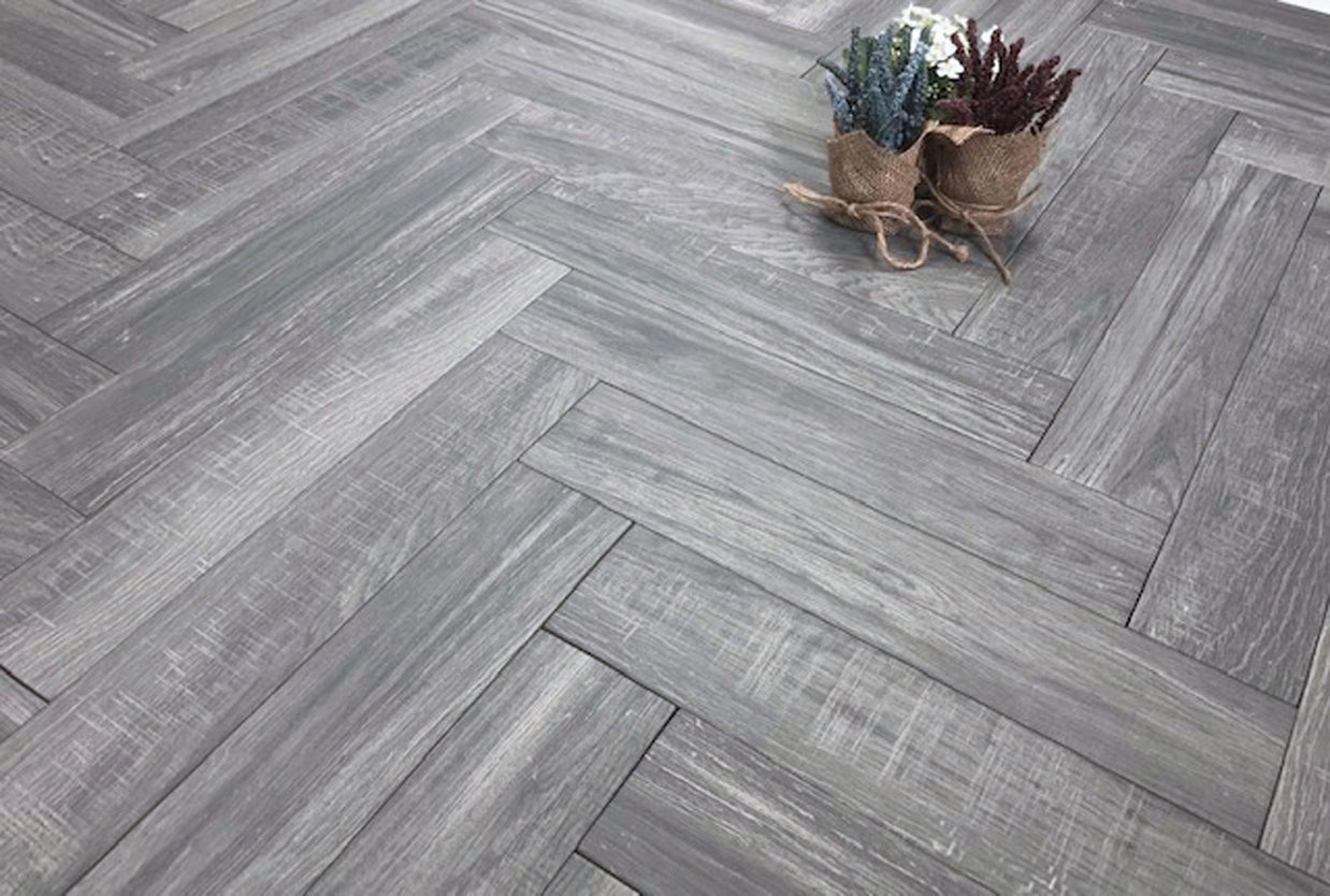 Cracovia Gris Wood Effect Herringbone, porcelain tile in 10x49cm at Irwin Tiles