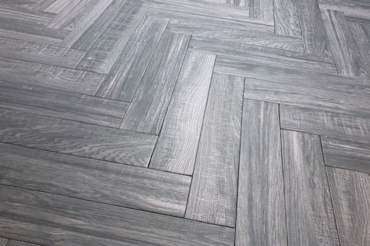 Cracovia Gris Wood Effect Herringbone, matt tile at Irwin Tiles