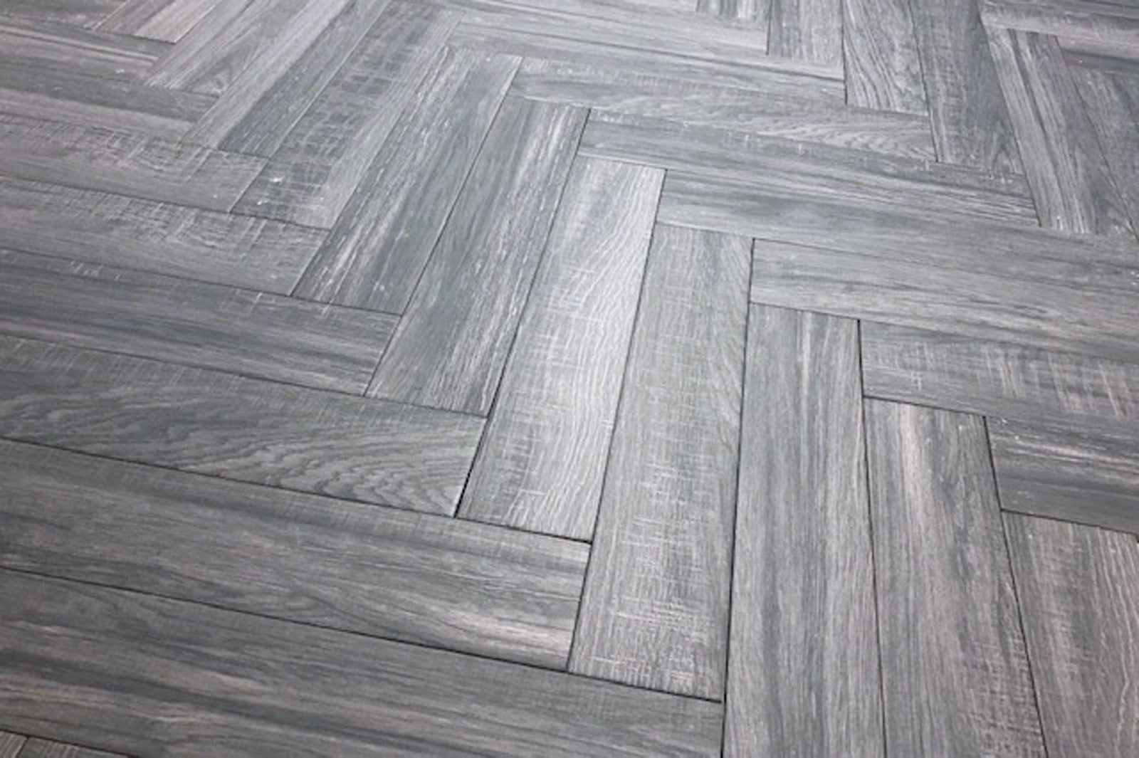 Cracovia Gris Wood Effect Herringbone, matt tile at Irwin Tiles