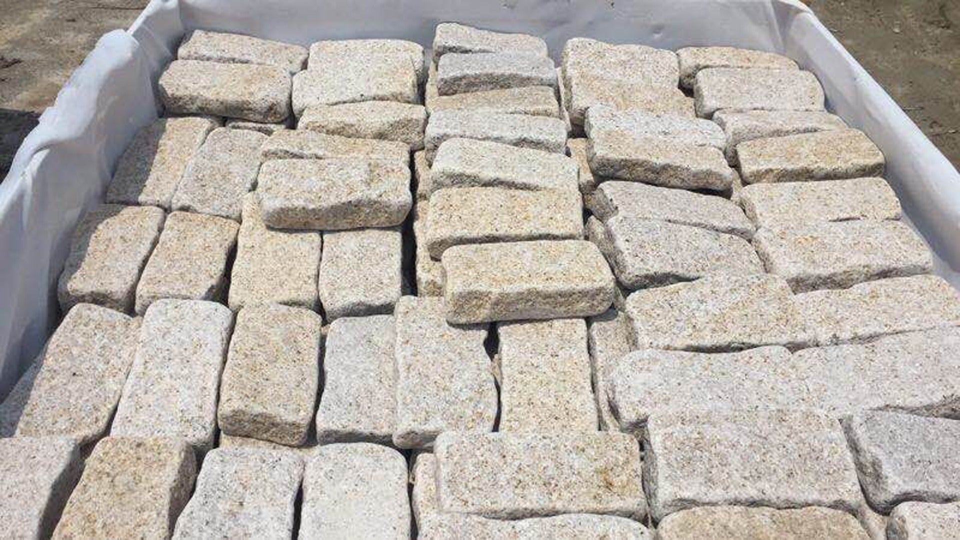 Natural Beige Granite Tumbled Cobbles 20x10cm, paving at Irwin Tiles