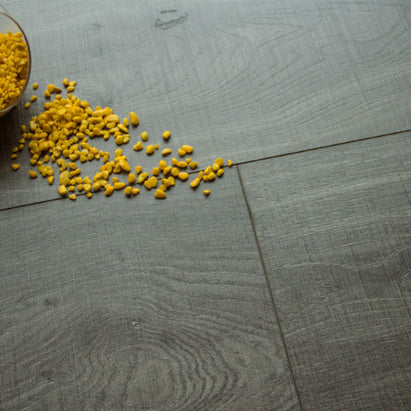 Grey Silver Stone Waterproof Laminate 12mm, laminate flooring for kitchens, hallways and living rooms at Irwin Tiles
