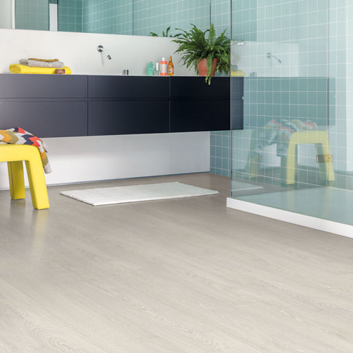 Quickstep Patina Classic Oak Light Laminate 8mm, laminate flooring for kitchens, hallways and living rooms at Irwin Tiles
