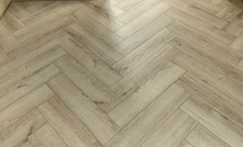 Le Harve Oak Herringbone Laminate 12mm All Over Water Resistant, laminate flooring at Irwin Tiles