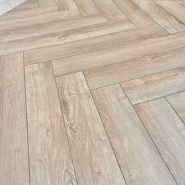 Natural Moss Herringbone Laminate 12mm Waterproof, laminate flooring for kitchens, hallways and living rooms at Irwin Tiles