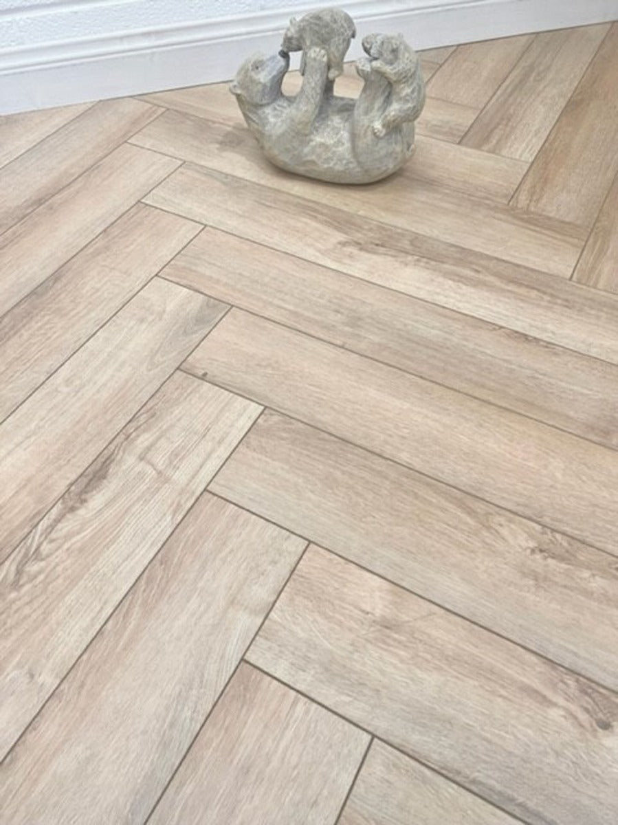 Natural Moss Herringbone Laminate 12mm Waterproof, laminate flooring at Irwin Tiles