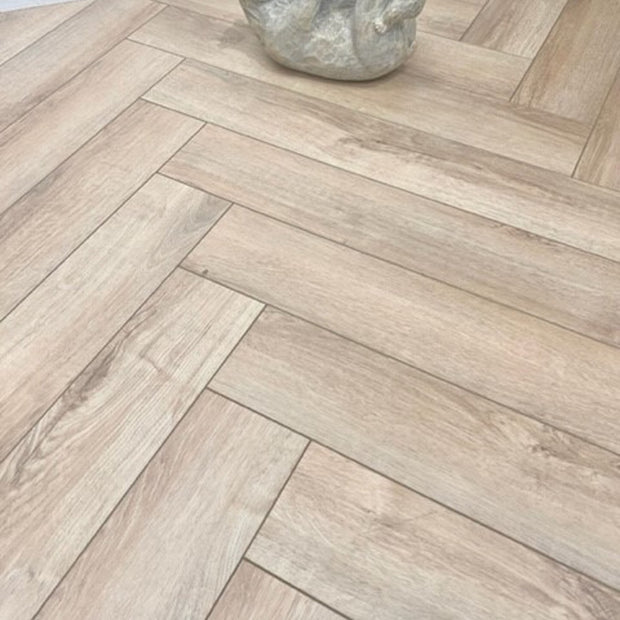 Natural Moss Herringbone Laminate 12mm Waterproof, laminate flooring at Irwin Tiles
