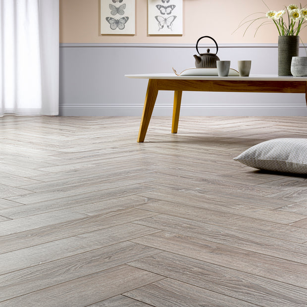 Sardinia Oak Herringbone Laminate 12mm All Over Water Resistant, laminate flooring for kitchens, hallways at Irwin Tiles