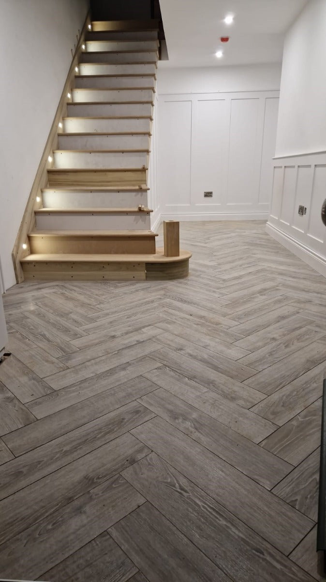 Sardinia Oak Herringbone Laminate 12mm All Over Water Resistant, laminate flooring from Irwin Tiles, Co. Monaghan