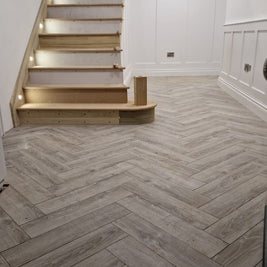 Sardinia Oak Herringbone Laminate 12mm All Over Water Resistant, laminate flooring from Irwin Tiles, Co. Monaghan