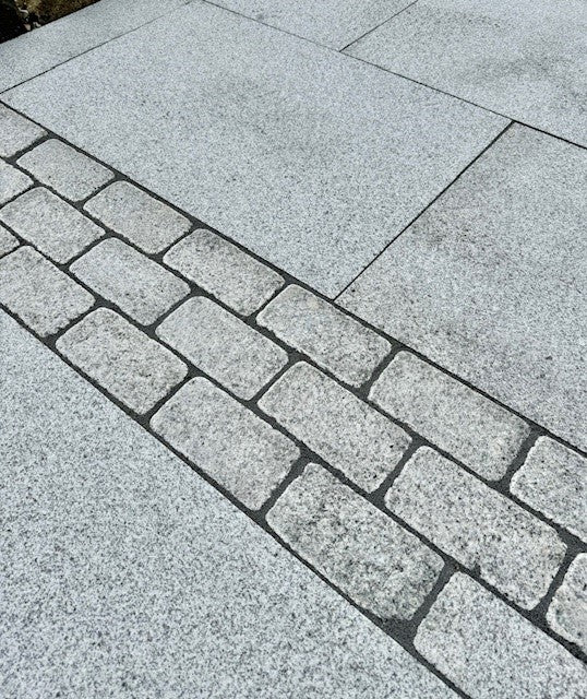 Silver Granite Tumbled Cobbles 20x10cmx5cm, natural stone paving for patios, paths and outdoor areas at Irwin Tiles