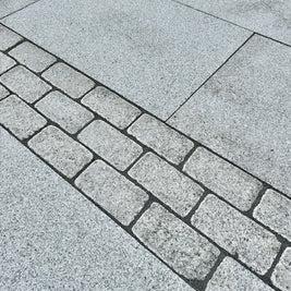 Silver Granite Tumbled Cobbles 20x10cmx5cm, natural stone paving for patios, paths and outdoor areas at Irwin Tiles