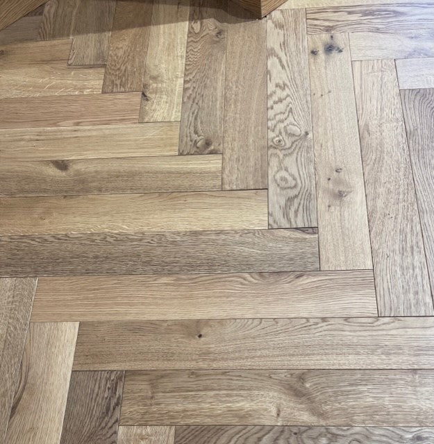Tudor Oak Engineered Herringbone, lacquered engineered wood flooring at Irwin Tiles