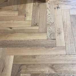 Tudor Oak Engineered Herringbone, lacquered engineered wood flooring at Irwin Tiles